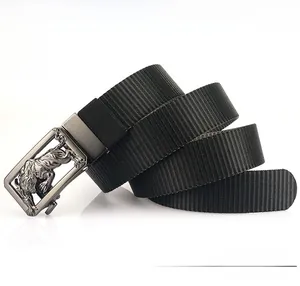 Detail of thick nylon webbing and zinc alloy buckle with embossed tiger head design