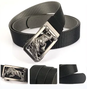 Close-up of black nylon belt with tiger head buckle and textured strap details