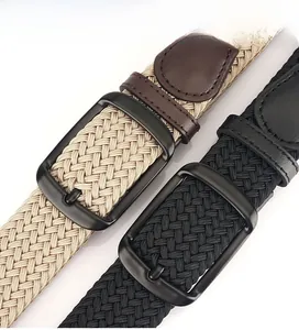 Detail of buckle and braided texture on khaki and black elastic fabric belts
