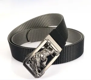 Close-up of tactical nylon belt with embossed metal tiger buckle in gunmetal finish