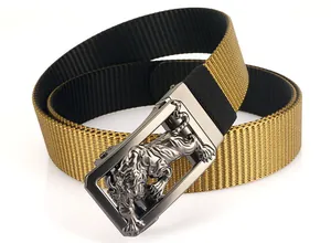 Detail of tiger relief buckle on dual-color nylon belt with golden woven texture