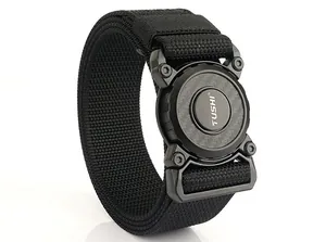 Detailed close-up of tactical nylon belt with circular quick-release buckle and TUSHI logo