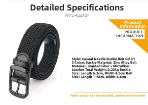 Detail of black woven elastic belt showing the buckle and silk textured fabric