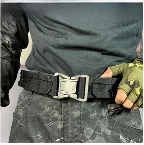 Close-up of quick-release alloy buckle and durable nylon tactical belt on a model