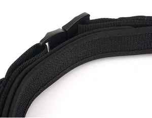 Close-up of black tactical nylon webbing and heavy-duty buckle with reinforced stitching