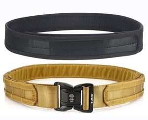 Detail of military tactical belt with quick-release metal buckle and MOLLE webbing system