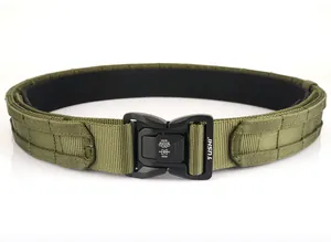 Close-up of quick-release metal buckle on tactical nylon belt with MOLLE webbing detail