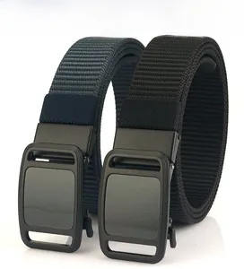 Detail view of navy blue and black nylon belts with matte black automatic alloy buckles
