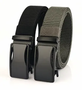 Close-up of black and army green nylon belts with matte automatic buckles