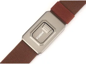 Detail of matte grey tactical buckle with white logo on brown nylon elastic belt