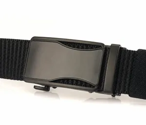 Close-up detail of the matte black zinc alloy quick-release buckle on a nylon woven belt