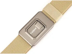 Close-up of quick release aluminum alloy buckle with TUSHI logo on khaki tactical nylon belt