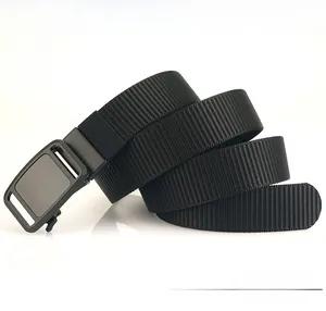 Close-up of thick black woven nylon belt with a matte black metal automatic buckle