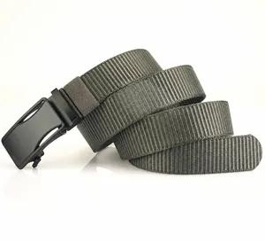 Detail view of the zinc alloy buckle and breathable woven nylon fabric of the tactical belt