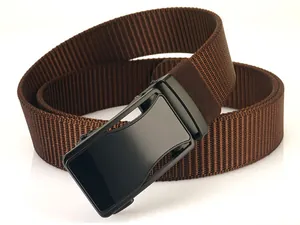 Detail of dark brown nylon belt with matte black automatic metal buckle on white background