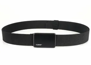 Close-up of tactical nylon belt with metal quick-release buckle and brand engraving