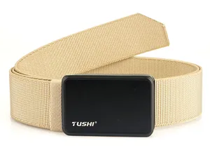 Macro detail of khaki nylon tactical belt with matte black quick release alloy buckle