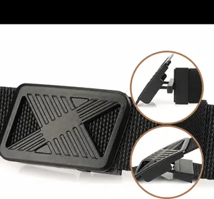 Detail of black nylon belt featuring a rotating press buckle with X-shaped geometry