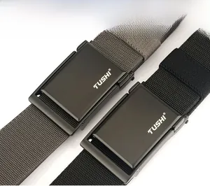 Detail of nylon canvas tactical belts with matte black automatic buckles and Tushi logo