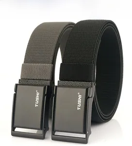 Close-up of black and grey men's nylon belts with TUSHI matte metal pressure buckles