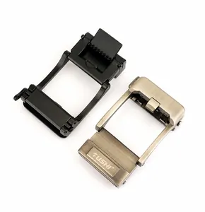 Detail of zinc alloy automatic belt buckles in matte black and brushed silver finishes