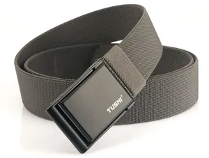 Detailed view of the woven nylon belt with a matte black automatic buckle and white logo