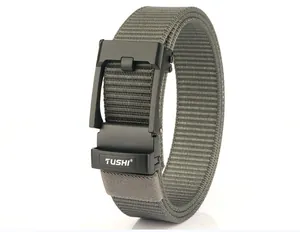 Macro detail of military green nylon tactical belt with matte black automatic metal buckle