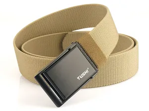 Close-up of tan nylon canvas tactical belt with matte black TUSHI brand buckle
