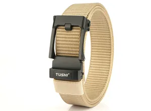 Detailed macro view of khaki tactical nylon belt strap with matte black metal buckle