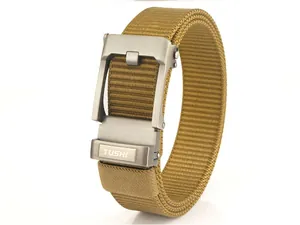 Close-up of khaki nylon tactical belt featuring a matte metal automatic buckle with TUSHI logo