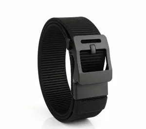 Detail of black nylon tactical belt with matte alloy buckle showing TUSHI logo