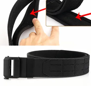Detail of tactical nylon belt with Velcro waist adjustment and gray metal buckle