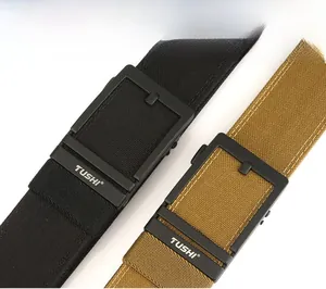 Macro shot of double-layered nylon tactical belt with matte automatic buckle and TUSHI logo