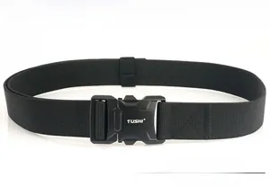 Detail of matte black quick-release aluminum alloy buckle on a nylon tactical belt