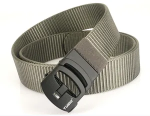 Detail view of military green nylon tactical belt with a matte black automatic buckle