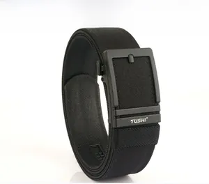Detail of black tactical nylon belt with matte black automatic buckle and logo