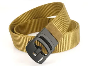 Close-up of the khaki nylon tactical belt with a matte black automatic buckle detail