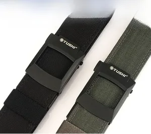Detail of nylon tactical belts with durable plastic buckles and textured weave pattern