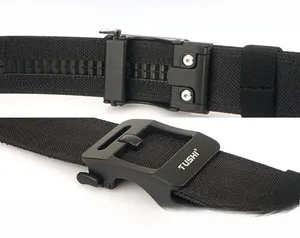 Detail of matte black tactical buckle with adjustable track on nylon webbing belt