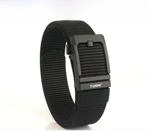 Detail of black tactical nylon belt with durable automatic buckle and TUSHI logo