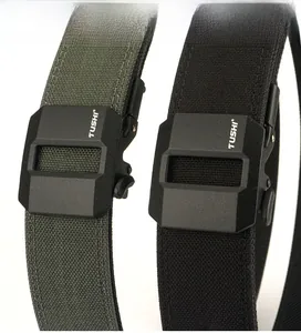 Detail of army green and black tactical nylon belts with heavy-duty quick release buckles