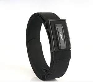 Close-up of black tactical nylon belt with automatic buckle and TUSHI logo detail