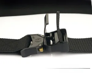 Detail of tactical nylon belt showing the metal quick-release buckle and inner structure