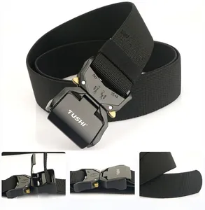Close-up of black nylon tactical belt buckle with quick release mechanism and 12KN logo