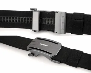 Detail of grey alloy automatic buckle with TUSHI logo and durable black nylon webbing