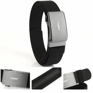 Detail of TUSHI nylon belt showing automatic alloy buckle and woven canvas texture