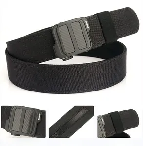 Macro detail of TUSHI tactical nylon belt featuring ergonomic carbon fiber buckle