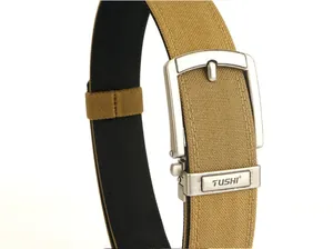 Detail of military tactical nylon belt with brushed metal buckle and TUSHI engraving