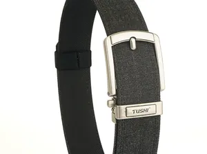 Macro detail of high-density black nylon tactical belt with brushed silver automatic buckle