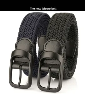 Detail of navy and black woven elastic belts with matte black alloy buckles